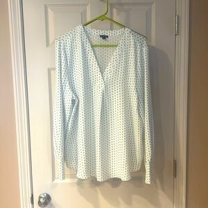 Long sleeve v neck  blouse with pleated front.